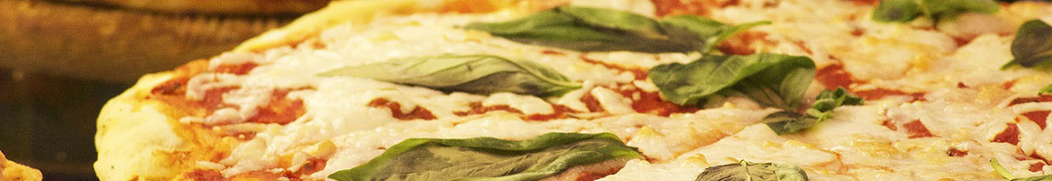 Eating Italian Pizza at Il Vesuvio Italian Restaurant & Pizzeria restaurant in Luray, VA.